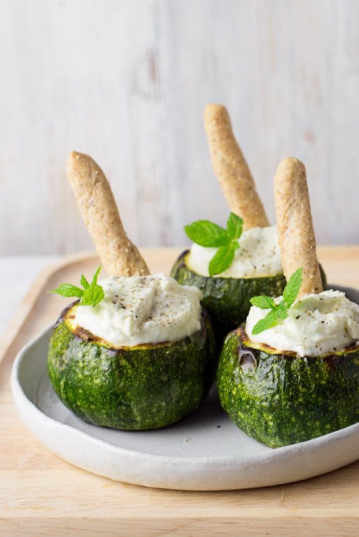 Zucchini stuffed with goat cheese and mint with Grissani
